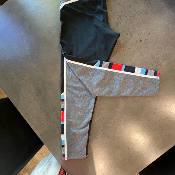 Tail leggings. Black with multi-colored stripes down the side. Size L. - Picture 1 of 10